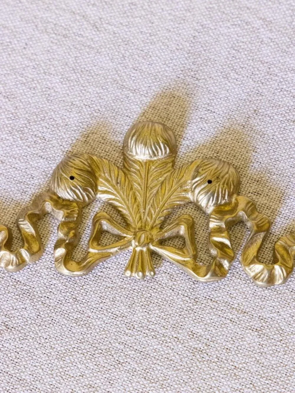 Brass Bow & Feather Wall Decor Accent